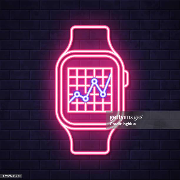 smartwatch with graph. glowing neon icon on brick wall background - measuring height on wall stock illustrations