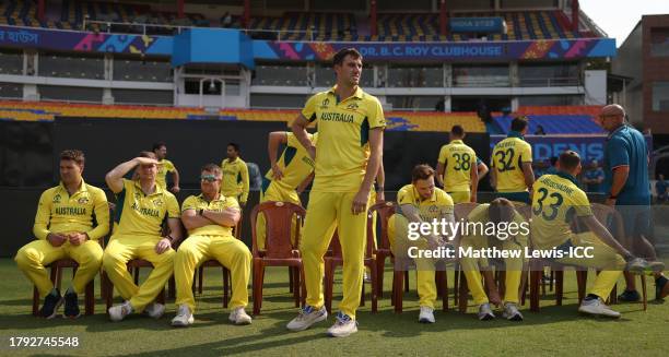 Pat Cummins of Australia waits for a team photo during a training session during the ICC Men's Cricket World Cup India 2023 at Eden Gardens on...
