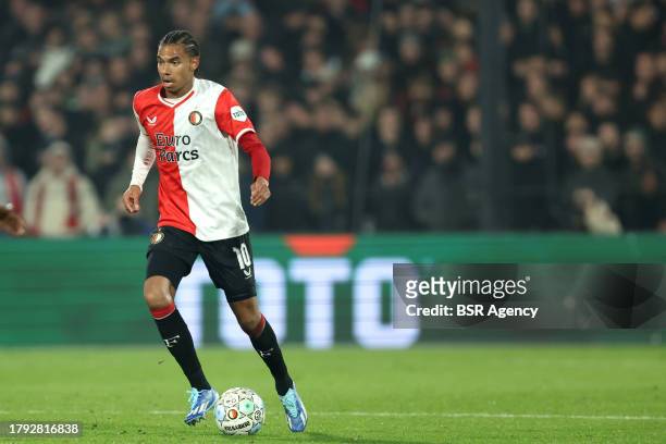 Calvin Stengs of Feyenoord runs with the ball during the Dutch Eredivisie match between Feyenoord and AZ at Stadion Feyenoord on November 12, 2023 in...