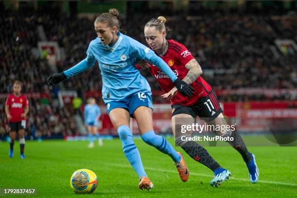 Filippa Angeldahl of Manchester City challenged by Leah Galton of Manchester United WFC during the Barclays FA Women's Super League match between...