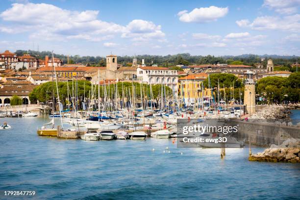 holidays in italy -  scenic view of the marina and historical and tourists town of desenzano del garda at garda lake - desenzano del garda stock pictures, royalty-free photos & images