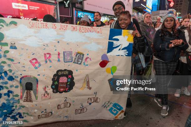 People attend sleep out night on Times Square as part of Covenant House annual global event to help raise money for young people facing homelessness...