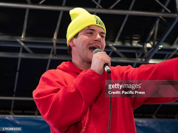 American actor and singer Colton Ryan performs during sleep out night on Times Square as part of Covenant House annual global event to help raise...
