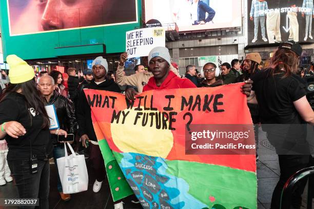 People prepare for sleep out night on Times Square as part of Covenant House annual global event to help raise money for young people facing...