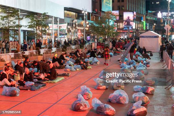 People prepare for sleep out night on Times Square as part of Covenant House annual global event to help raise money for young people facing...