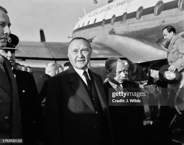 West German Chancellor Konrad Adenauer arriving at London Airport, September 27th 1954. Adenauer is in London to attend the Nine-Power Conference on...