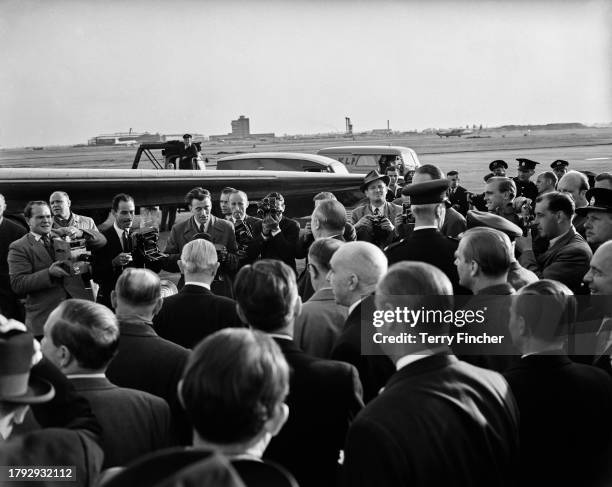 West German Chancellor Konrad Adenauer is met by members of the press on arrival at London Airport, September 27th 1954. Adenauer is in London to...