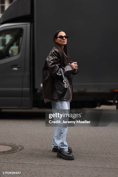 Anna Winter seen wearing Celine black sunglasses, By Aylin Koenig brown wool knit sweater / pullover, The Frankie Shop brown shiny leather crocodile...