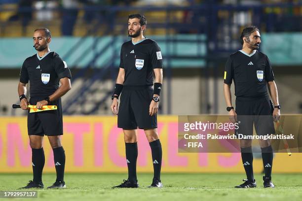 Referee Omar Mohamed Al Ali looks on with assistants after to the FIFA U-17 World Cup Group D match between Senegal and Poland at Si Jalak Harupat...