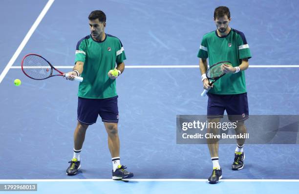 Maximo Gonzalez of Argentina and Andres Molteni of Argentina in action during their Men's Doubles Round Robin Nitto ATP Finals match against Edouard...