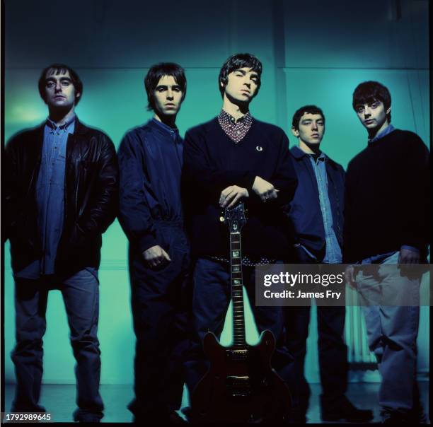 Group portrait of British rock band Oasis at Nomad Studios in Manchester, United Kingdom, 29th November 1993. L-R Paul Arthurs , Liam Gallagher, Noel...