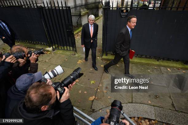 Minister for Development in the Foreign Office, Andrew Mitchell , and Britain's new Foreign Secretary, former Prime Minister, David Cameron , arrive...