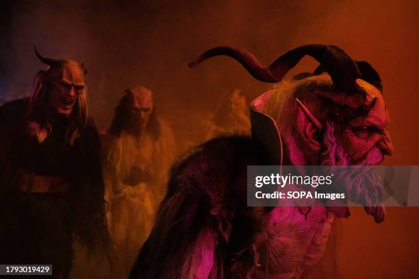 Krampusse walk by during a Krampus run. More than 600 Krampuses from Slovenia, Austria, Italy, and Croatia joined the tenth anniversary of the...