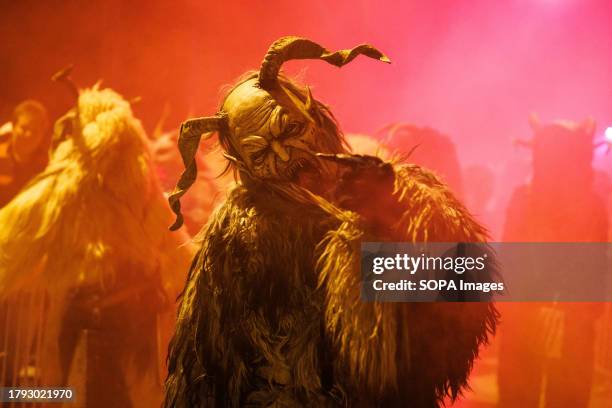 Krampus poses for a photo during a Krampus run. More than 600 Krampuses from Slovenia, Austria, Italy, and Croatia joined the tenth anniversary of...