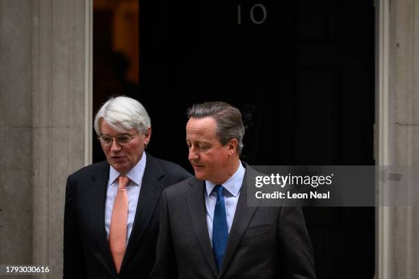 Minister for Development in the Foreign Office, Andrew Mitchell , and Britain's new Foreign Secretary, former Prime Minister, David Cameron leave the...