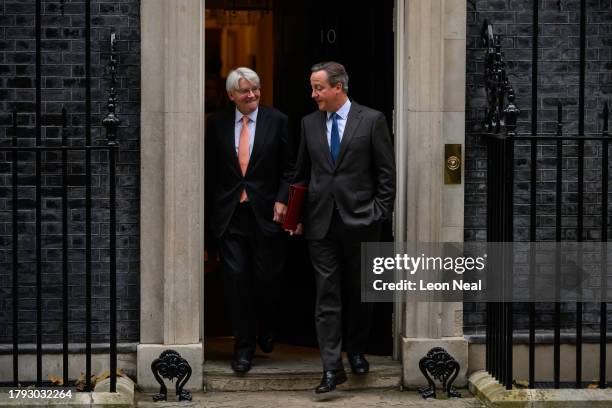 Minister for Development in the Foreign Office, Andrew Mitchell , and Britain's new Foreign Secretary, former Prime Minister, David Cameron leave the...