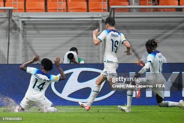 Reiss Denny of England celebrates with teammates after scoring the team's first goal during the FIFA U-17 World Cup Group C match between England and...