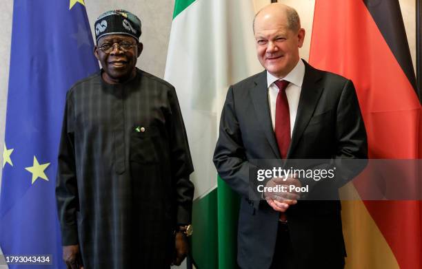 German Chancellor Olaf Scholz and President of Nigeria Bola Ahmed Tinubu prior to their meeting during the G20 Investment Summit - German Business...