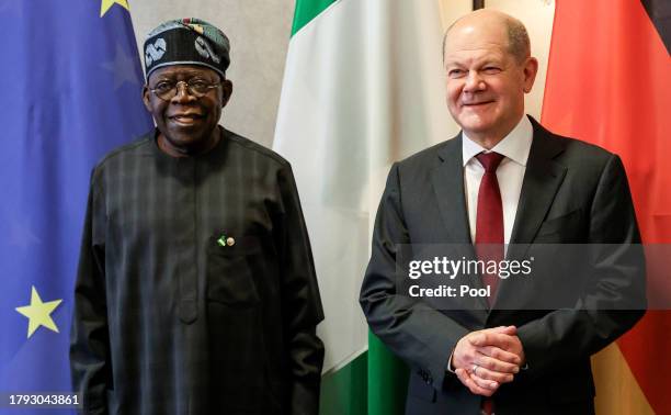 German Chancellor Olaf Scholz and President of Nigeria Bola Ahmed Tinubu prior to their meeting during the G20 Investment Summit - German Business...