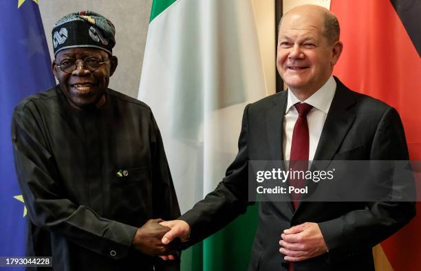 German Chancellor Olaf Scholz and President of Nigeria Bola Ahmed Tinubu prior to their meeting during the G20 Investment Summit - German Business...