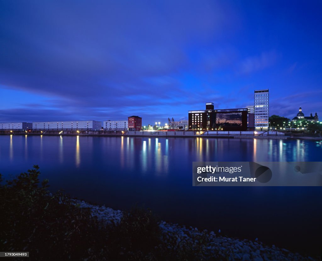 Cityscape view of Mannheim on the waterfront at night