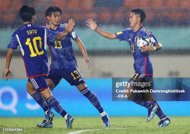 Rento Takaoka of Japan celebrates after scoring the team's first goal during the FIFA U-17 World Cup Group D match between Japan and Argentina at Si...