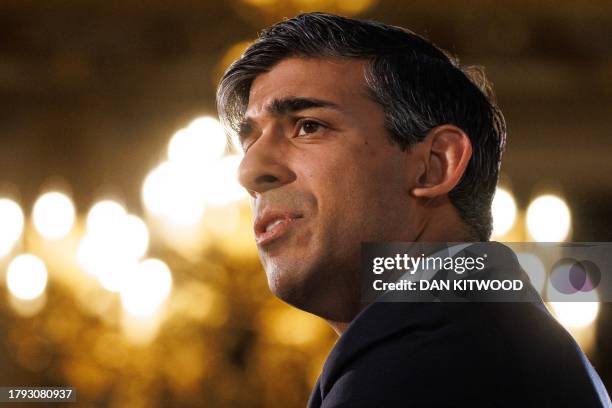 Britain's Prime Minister Rishi Sunak addresses the opening session of the Global Food Security Summit at Lancaster House in London on November 20,...