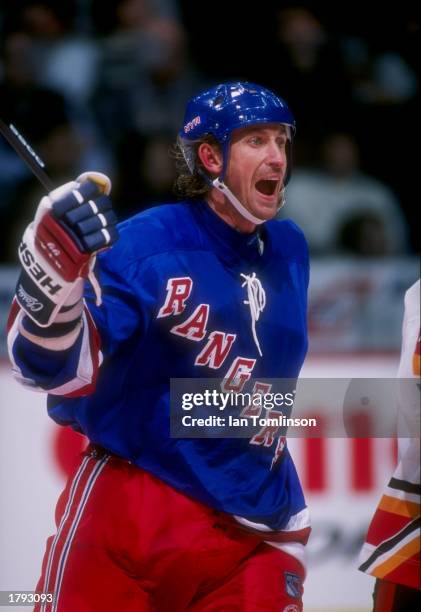 Center Wayne Gretzky of the New York Rangers celebrates during a game against the Calgary Flames at the Canadian Airlines Saddledome in Calgary,...