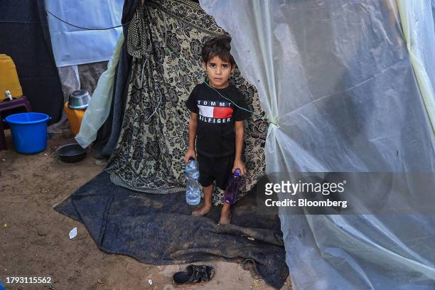 Child in a camp for displaced Palestinians near the Shuhada Al-Aqsa hospital in Deir al-Balah, Gaza, on Monday, Nov. 13, 2023. While Israel has...