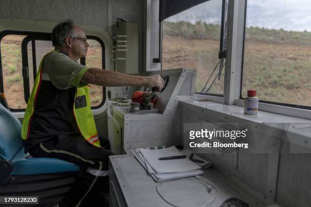 Driver operates a trolley train on the central corridor rail freight line, between Sentrarand depot and Pyramid South depot, in Gauteng, South...