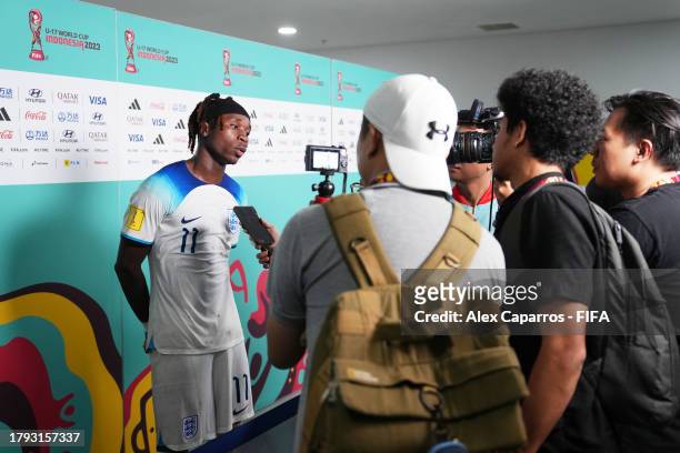 Joel Ndala of England speaks to the media in the flash interview after the team's victory during the FIFA U-17 World Cup Group C match between...