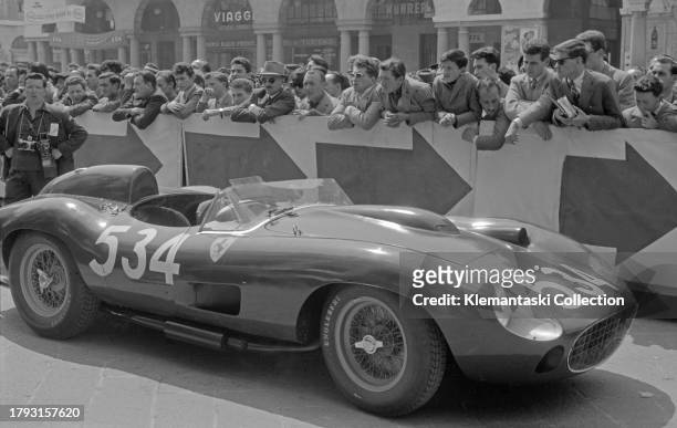 The Mille Miglia; Brescia, May 11, 1957. The Ferrari 335 Spot of Peter Collins/Louis Klemantaski. They retired at Parma having led much of the race.