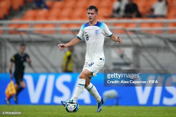 Chris Rigg of England runs with the ball during the FIFA U-17 World Cup Group C match between England and IR Iran at Jakarta International Stadium on...