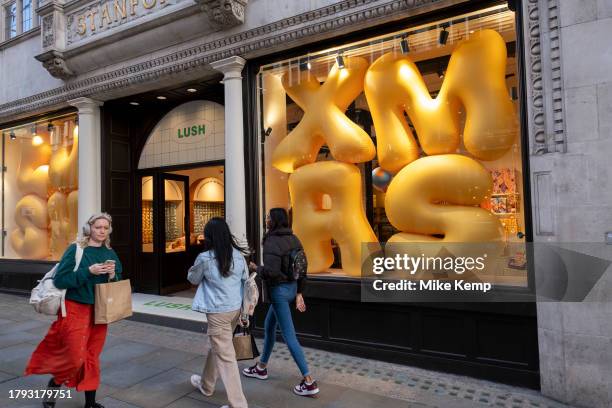 Inflatable letters spelling the word Xmas as a Christmas shop window display for the cosmetic brand Lush on 13th November 2023 in London, United...