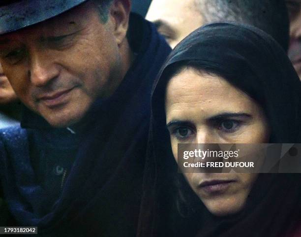 French late President François Mitterrand's daughter Mazarine Pingeot-Mitterrand and former Prime Minister Laurent Fabius attend a ceremony marking...