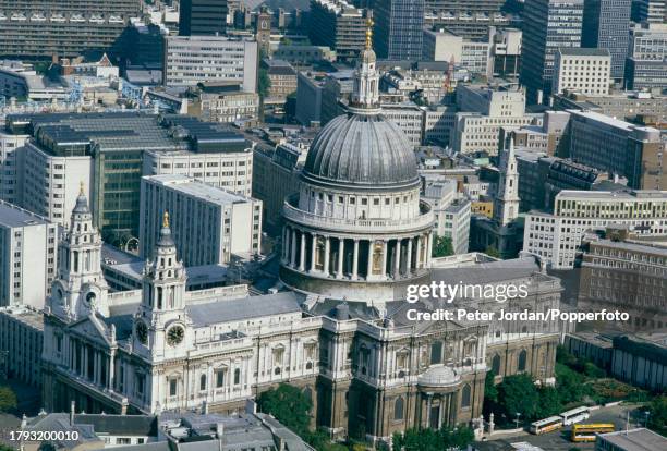 View from the air of office buildings surrounding St Paul's Cathedral in the City of London on 12th May 1982. Visible on top left are apartment...