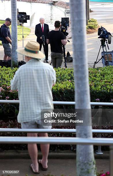 Australian Prime Minister, Kevin Rudd is watched as he speaks during a television interview, on September 2, 2013 in Townsville, Australia. According...