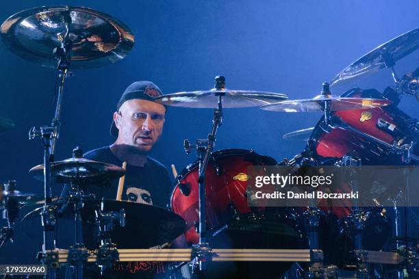 Jon Larsen of Volbeat performs on stage during Rock Allegiance Tour 2013 at US Cellular Coliseum on August 29, 2013 in Bloomington, Illinois.