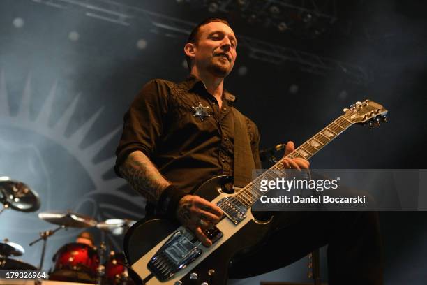 Michael Poulsen of Volbeat performs on stage during Rock Allegiance Tour 2013 at US Cellular Coliseum on August 29, 2013 in Bloomington, Illinois.