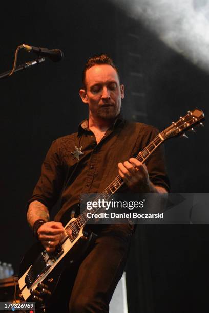 Michael Poulsen of Volbeat performs on stage during Rock Allegiance Tour 2013 at US Cellular Coliseum on August 29, 2013 in Bloomington, Illinois.