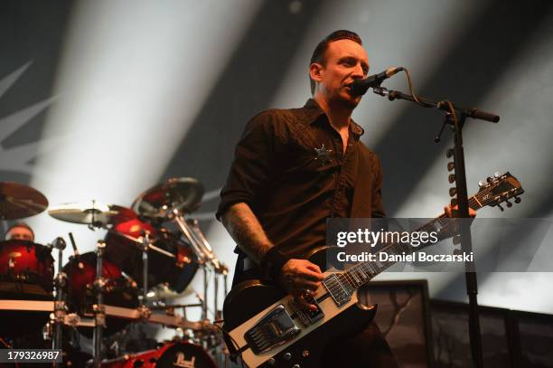 Michael Poulsen of Volbeat performs on stage during Rock Allegiance Tour 2013 at US Cellular Coliseum on August 29, 2013 in Bloomington, Illinois.