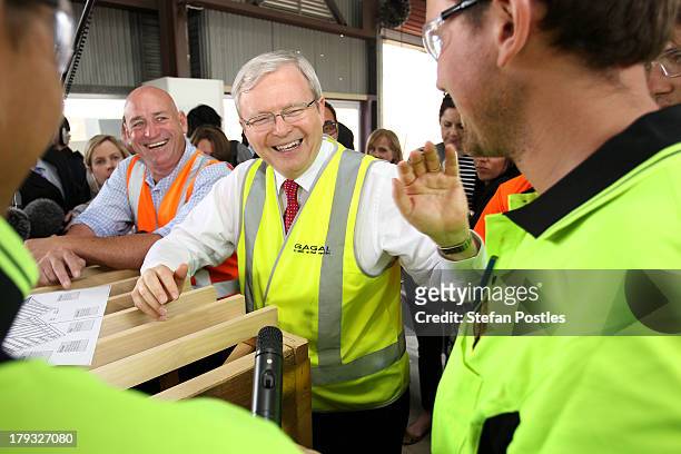 Australian Prime Minister, Kevin Rudd speaks to workers in a factory, on September 2, 2013 in Gladstone, Australia. According to the News Limited...