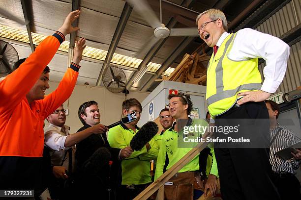 Australian Prime Minister, Kevin Rudd speaks to workers in a factory, on September 2, 2013 in Gladstone, Australia. According to the News Limited...