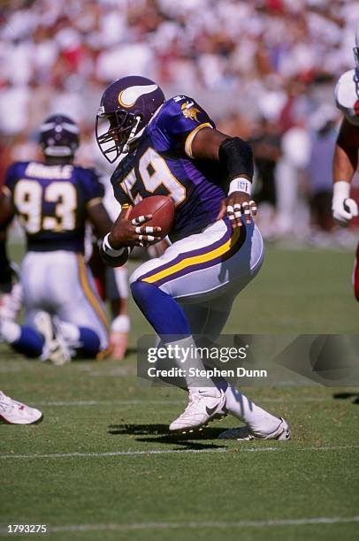 Linebacker Dixon Edwards of the Minnesota Vikings moves the ball during a game against the Arizona Cardinals at Sun Devil Stadium in Tempe, Arizona....