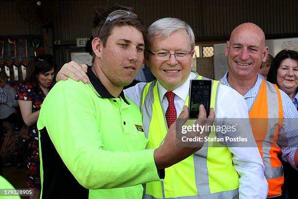 Australian Prime Minister, Kevin Rudd poses for a photo with a supporter on September 2, 2013 in Gladstone, Australia. According to the News Limited...