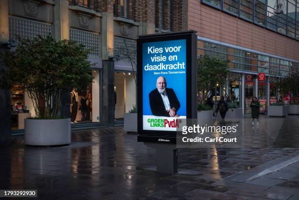 Campaign poster for the GroenLinksPvdA alliance featuring a picture of party leader Frans Timmermans is displayed on November 20, 2023 in The Hague,...