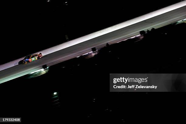 Kyle Busch, driver of the M&M's Toyota, races during the NASCAR Sprint Cup Series AdvoCare 500 at Atlanta Motor Speedway on September 1, 2013 in...