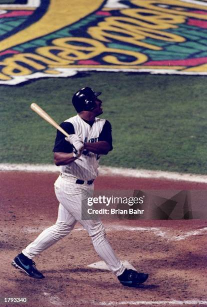 Third baseman Bobby Bonilla of the Florida Marlins hits a solo home run in the 7th inning during Game 7 of the 1997 World Series against the...