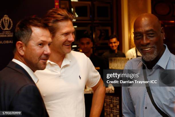 Ricky Ponting, Shane Watson and Sir Vivian Richards share a moment during the ICC Hall of Fame Celebration on November 14, 2023 in Mumbai, India.