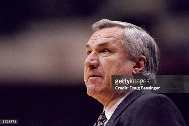 Head coach Dean Smith of the North Carolina Tar Heels looks on during a NCAA Tournament game against the Texas Tech Red Raiders at the Richmond...